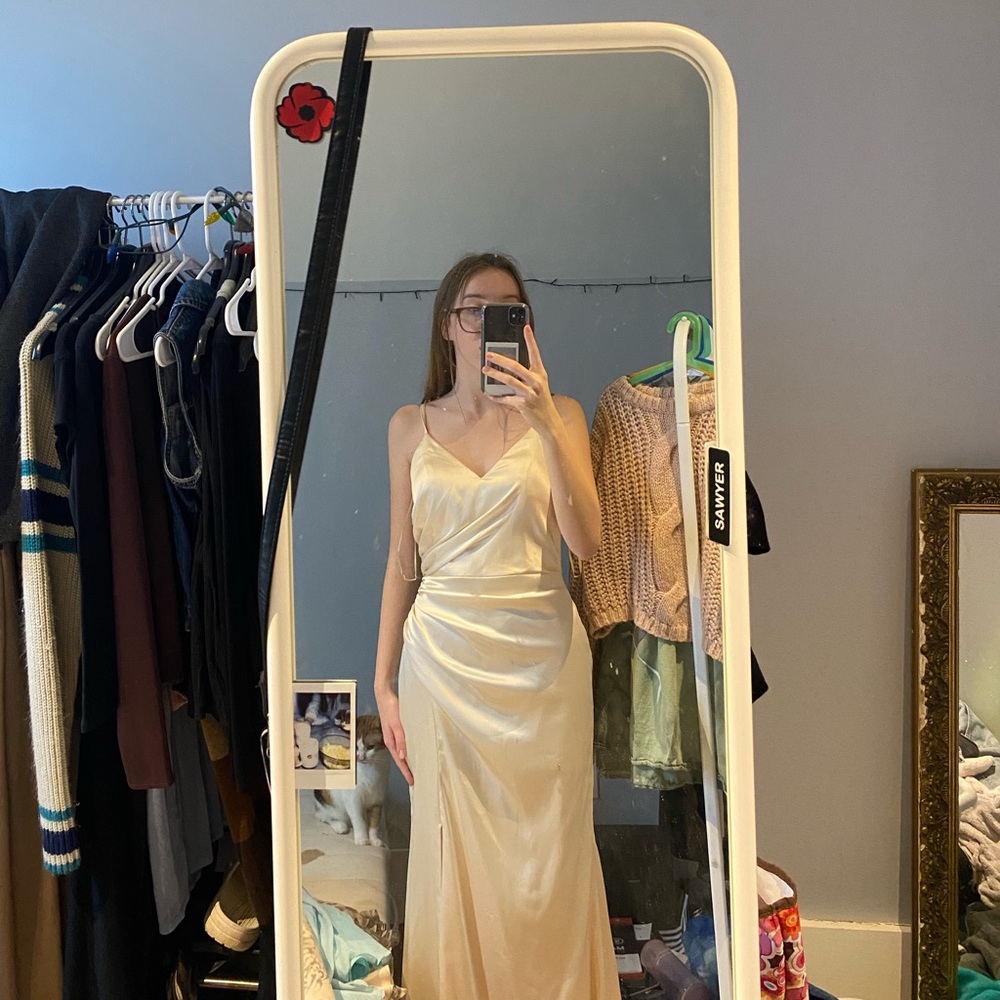 beautiful satin bridesmaids dress with a short side slit and ruching details